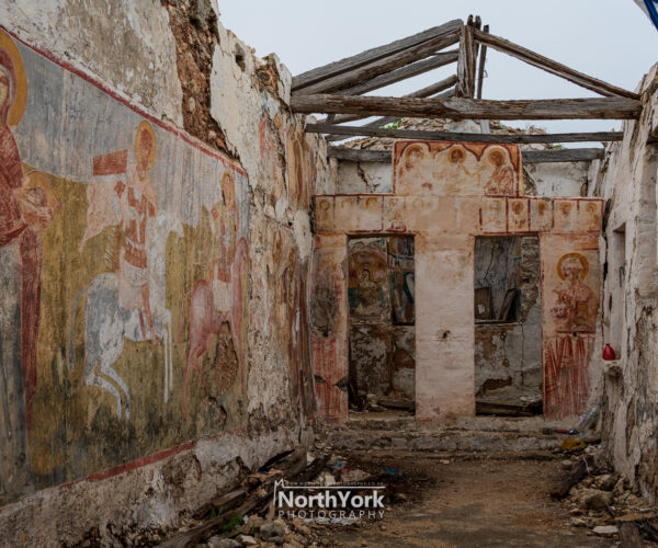an abandoned and ruined monastery in old perithia, corfu