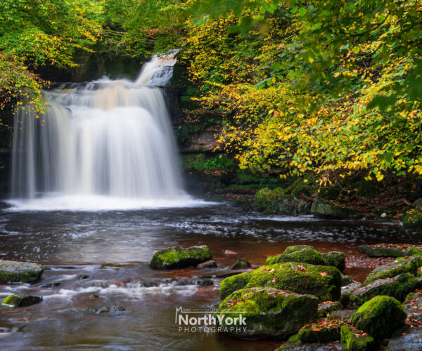 autumn waterfall scence of cauldron falls in west burton